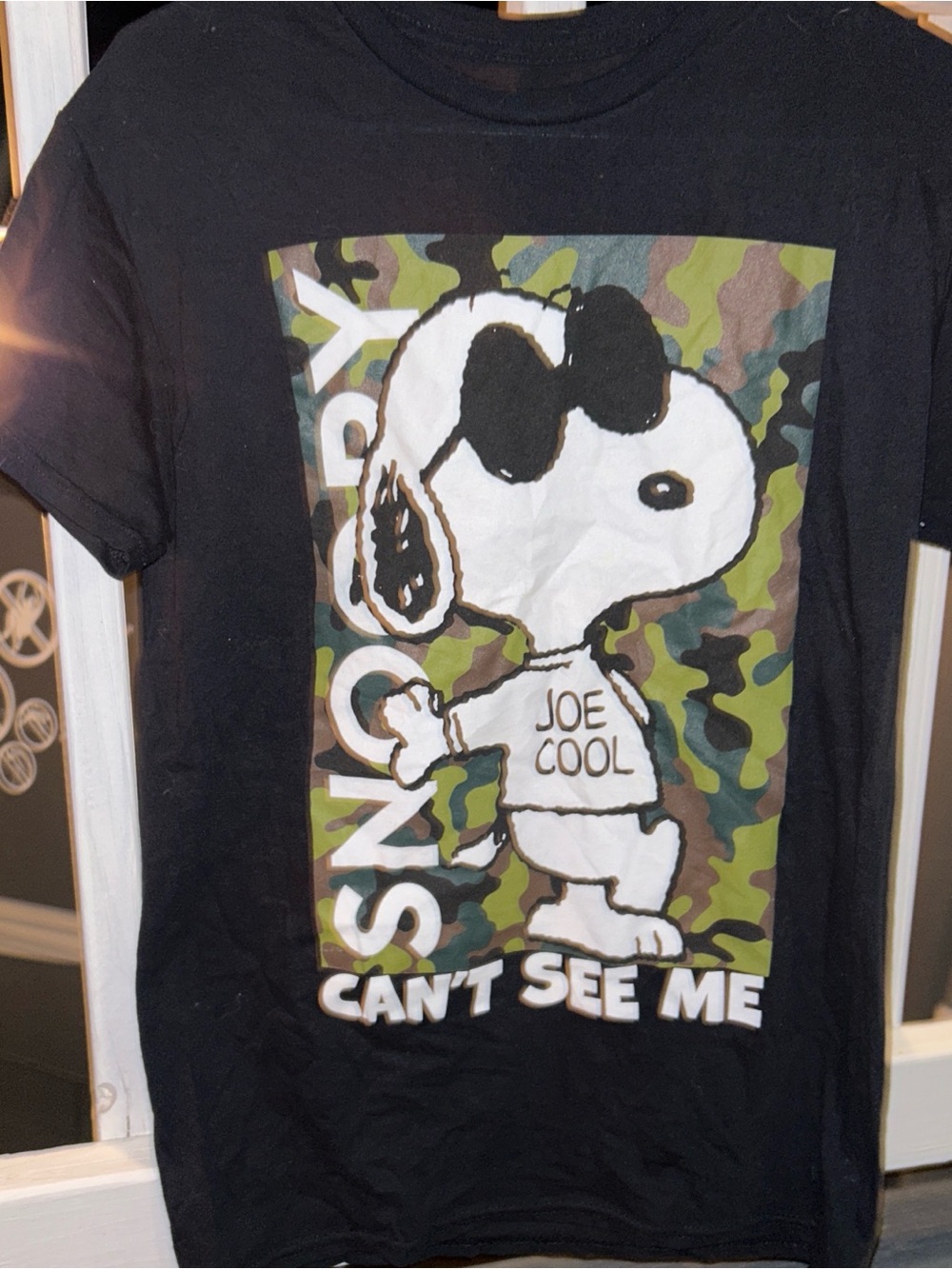 Peanutsw Black Tee with Snoopy "Joe Cool" Camo Graphic